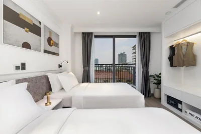 Twin Room with Balcony — CityHouse- El Pino Realm at Metro Ben Thanh Market